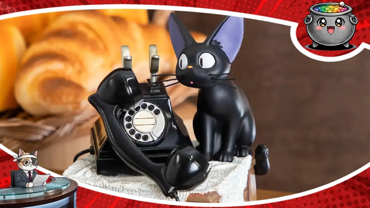 Kolekcjonerska pozytywka inspirowana filmem Podniebna poczta Kiki przedstawiająca kota Jiji obok starego telefonu rotacyjnego.